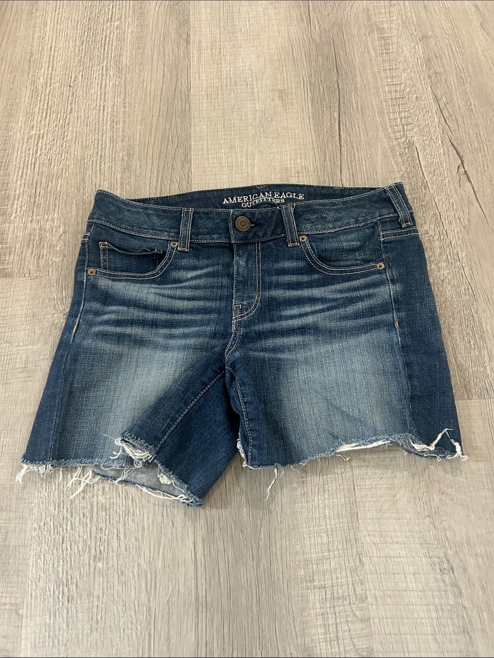 American Eagle Outfitters blue distressed frayed hem jean shorts